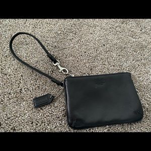 Black leather Coach wristlet.